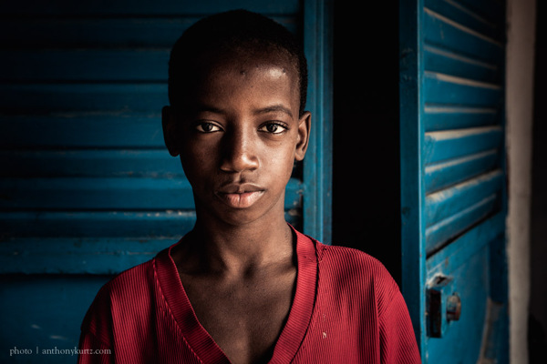 Untitled (Red Boy, Blue Doors)